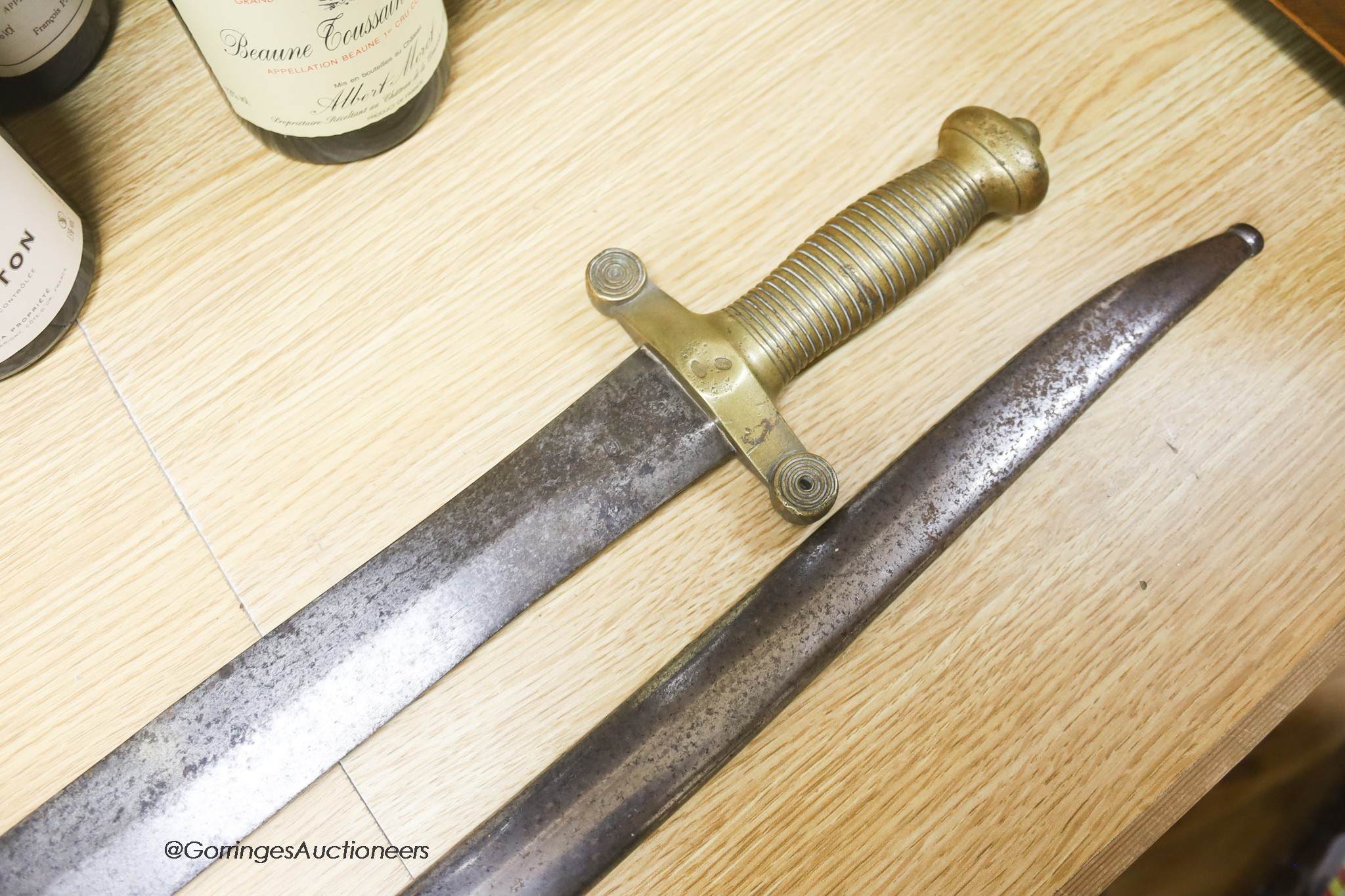 A bayonet and a 19th century French short sword, longest 71cm